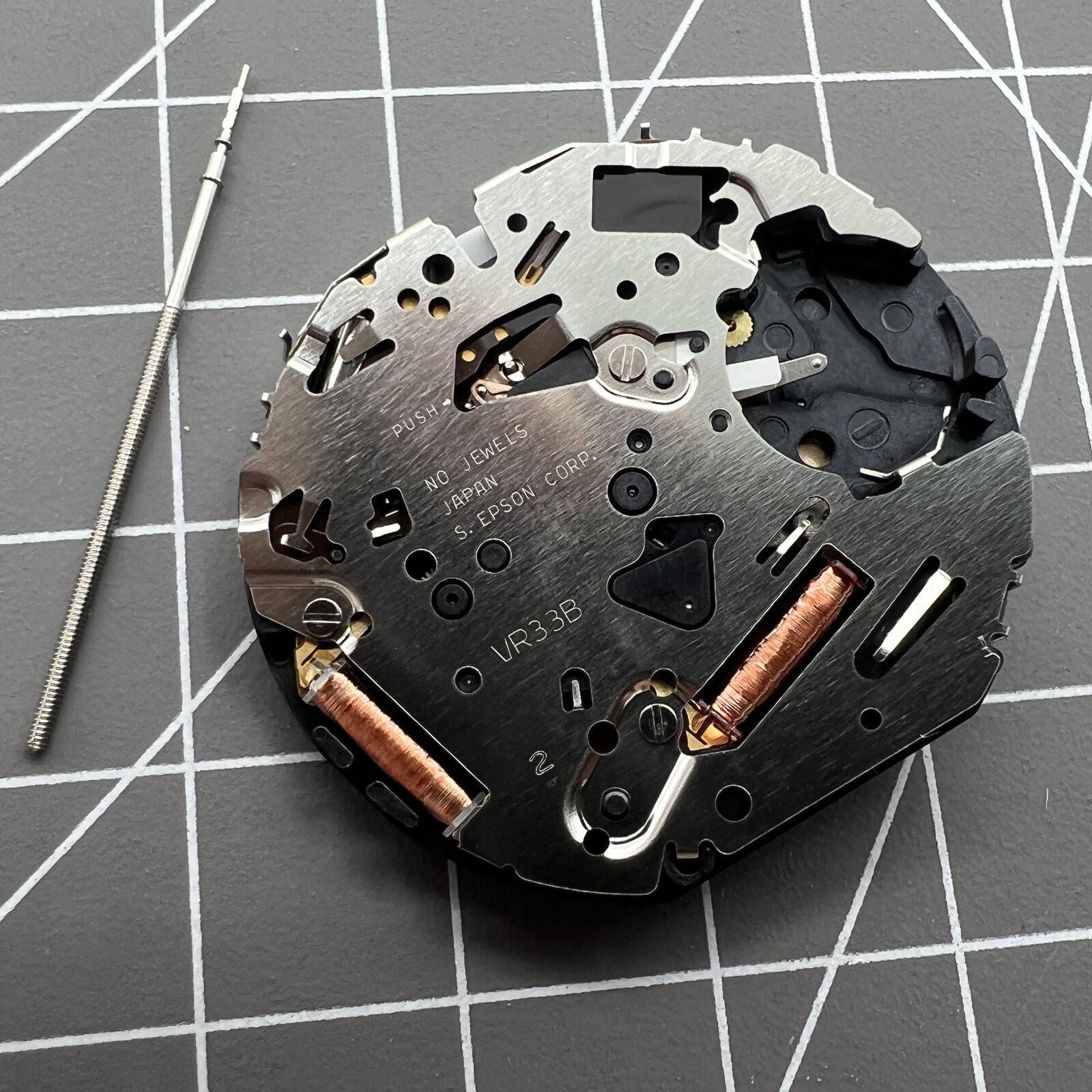 Hattori Epson TMI Japan VR33B quartz watch movement for accurate watch accessory repairs.