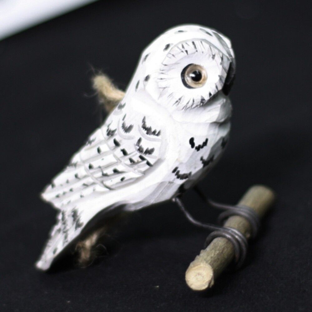 Handmade white owl wooden figurine, charming decorative artwork for home or office display.