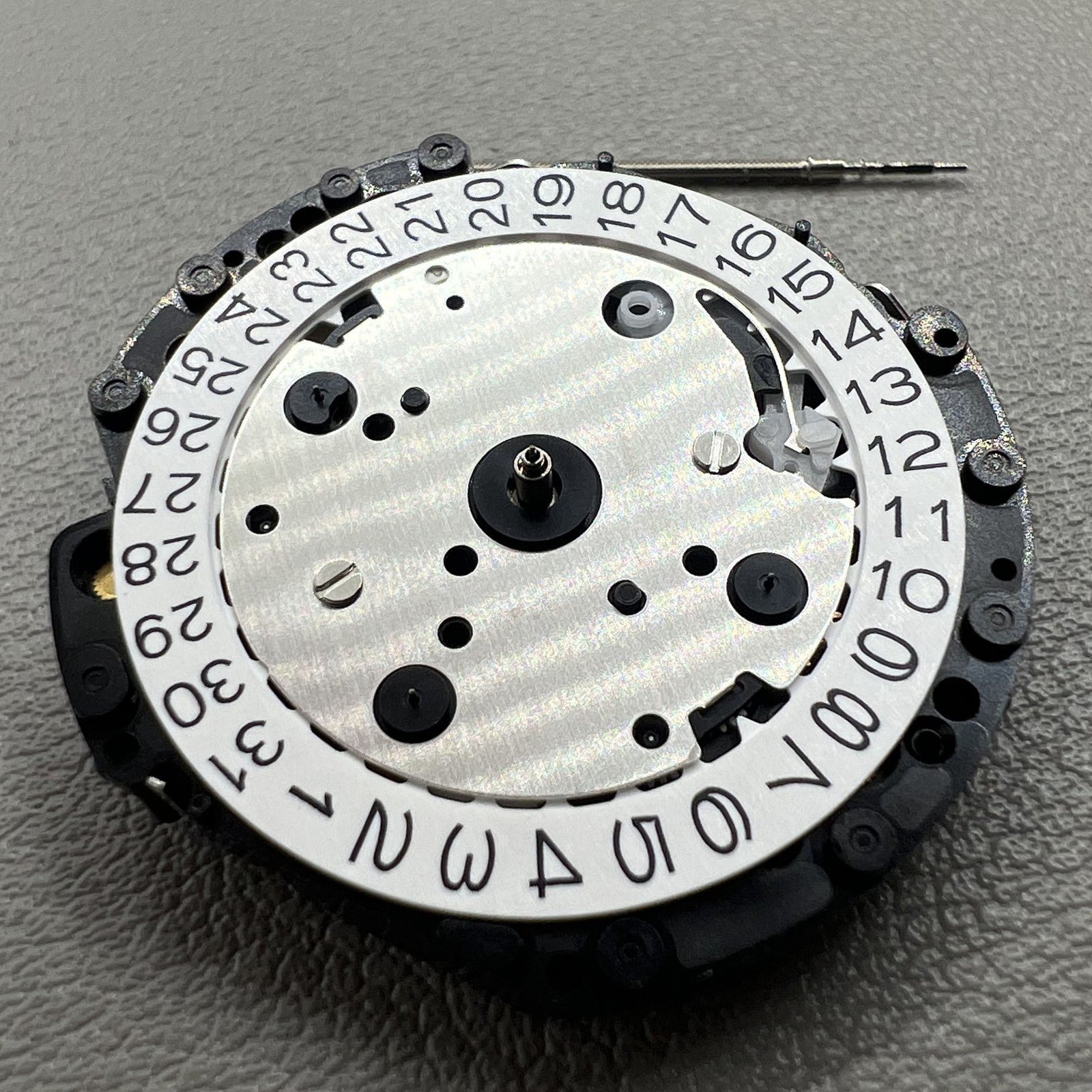 Japan Hattori Epson VD57C quartz watch movement for precise timekeeping in accessories.