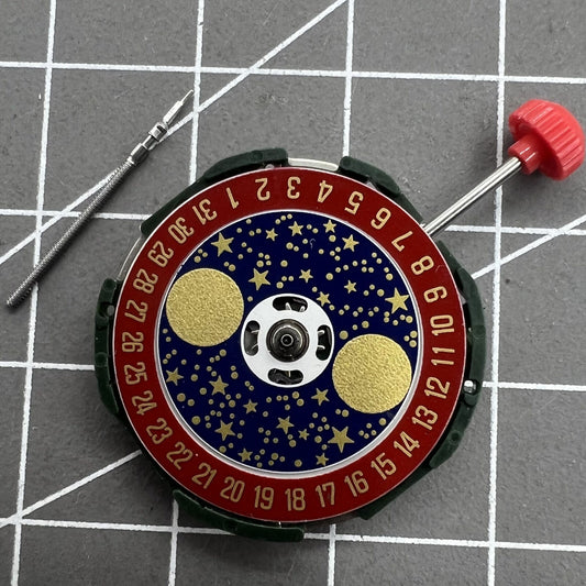 Miyota 2105 quartz watch movement with red dial and star moon phase display, precise timekeeping accessory.