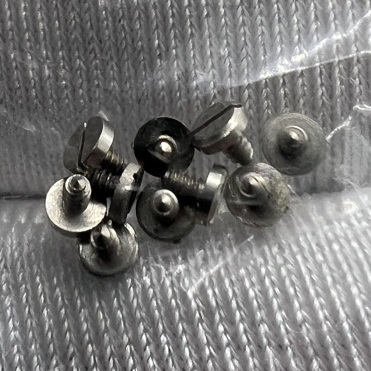 10pcs Generic 7120 Movement watch dial feet screws for secure watch accessory repairs.