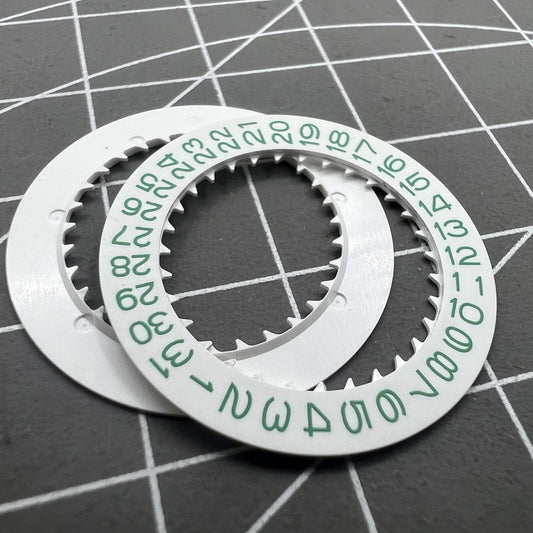 Green character disk date wheel for NH35 NH36 Date@3 watch movement on white background.