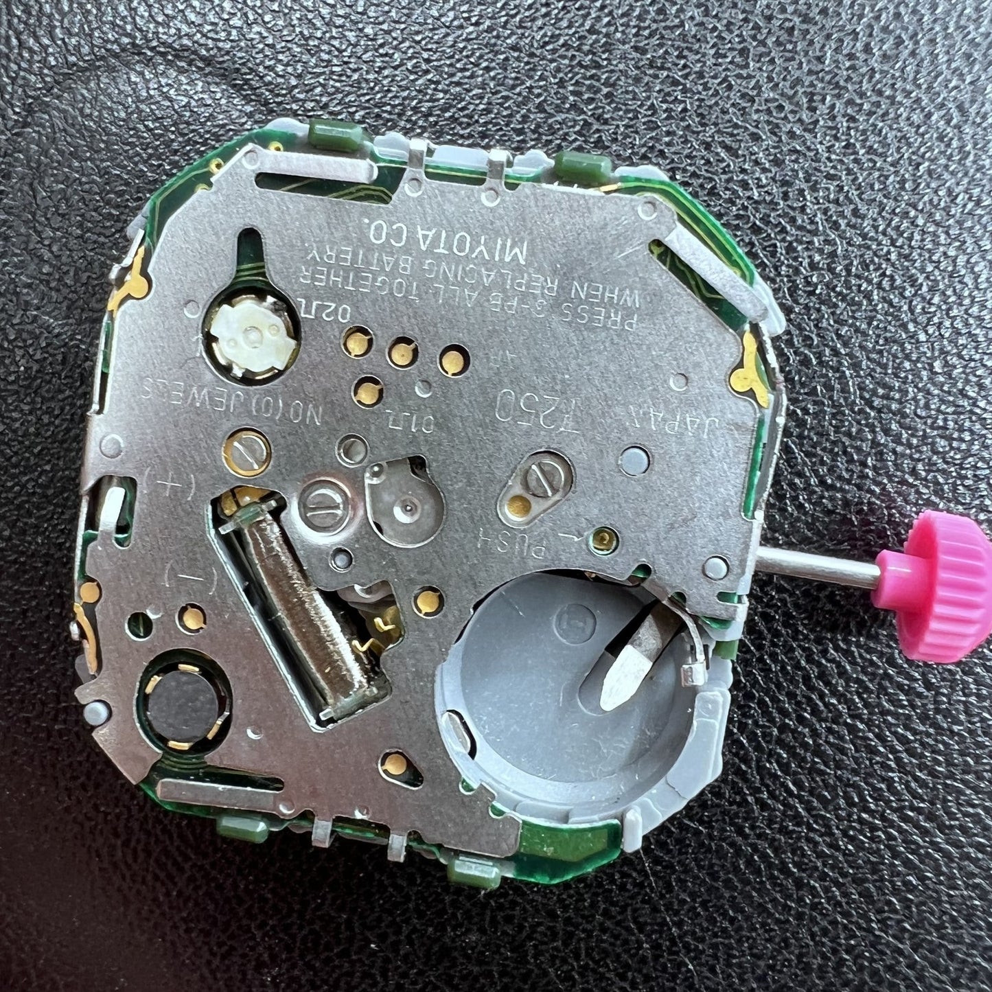 Miyota T250 quartz watch movement with three hands, Japanese precision for watch accessories.