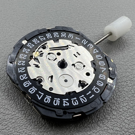 Japan Seiko 7T85A quartz watch movement showcasing precise timekeeping technology.