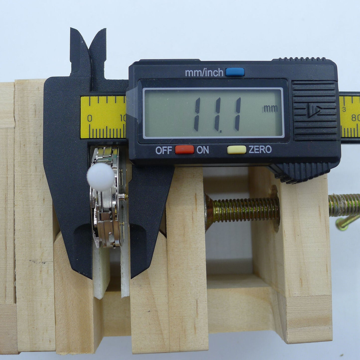 Asia Made 7751 7753 watch movement displaying moon phase complication and intricate mechanical gears.