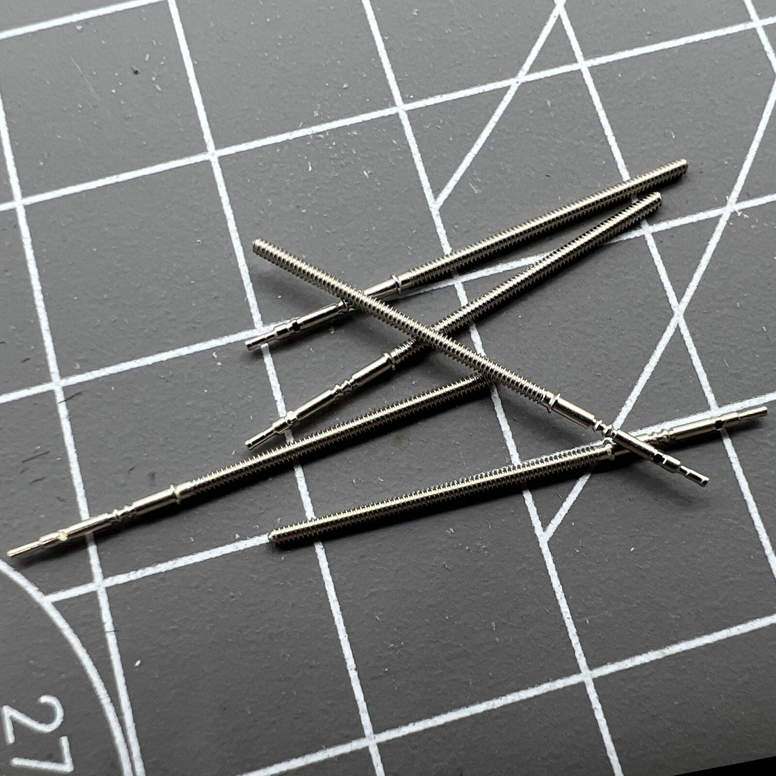 Replacement winding stem for PE70 watch movement, compatible with multiple watch models.