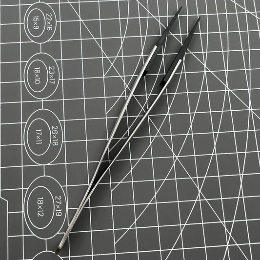 Stainless steel Carbon Fiber Head Tweezers for precise watch repair.