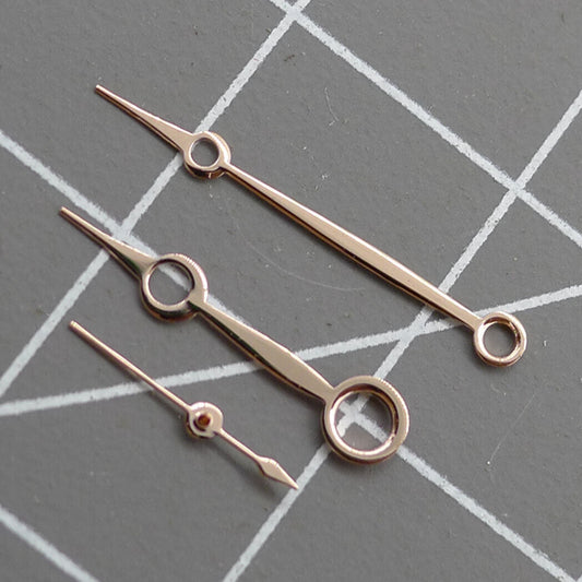 Rose gold watch hands for Seagull ST3600 movement, elegant replacement for mechanical watches.