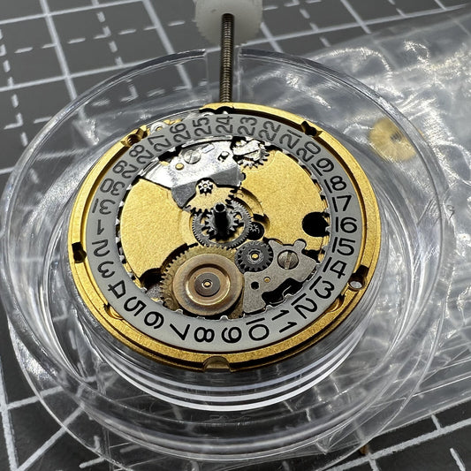 Swiss ETA 956.112 quartz watch movement with 3 hands and date display at 3 o?clock, reliable precision.