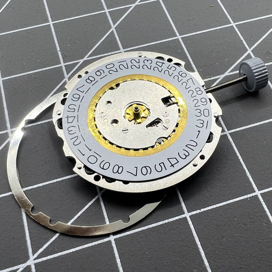 Swiss Made Ronda 705 quartz watch movement with date display at 3 o'clock for precise timekeeping