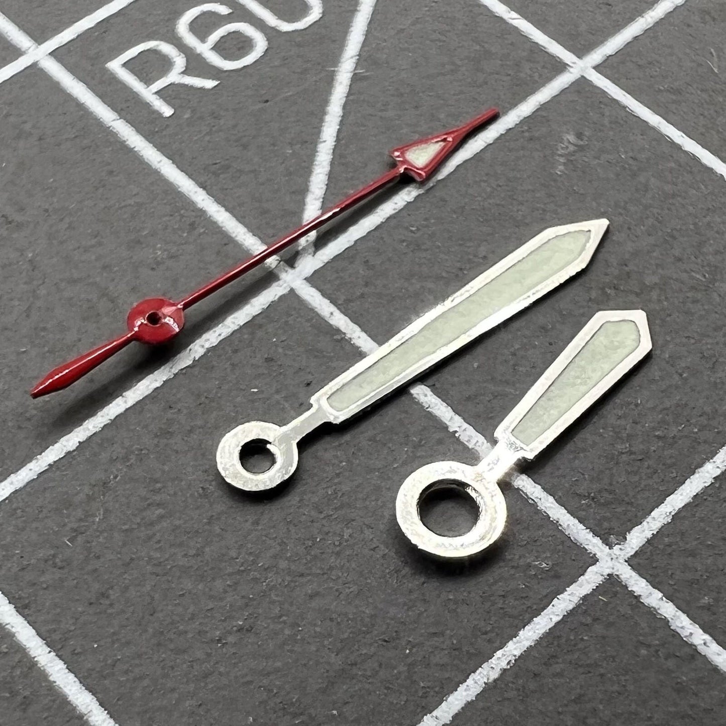 14mm silver-trimmed green luminous watch hands set for Miyota 2035 movement, ideal for precise time updates.