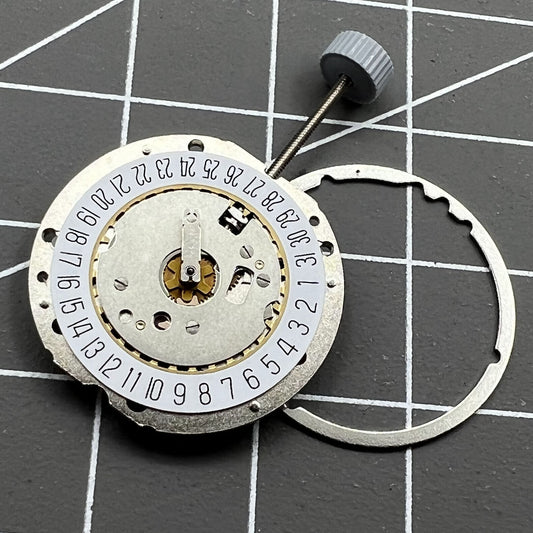 Swiss Ronda 785 quartz watch movement with date at 6, precision three-hand design for watch accessories.