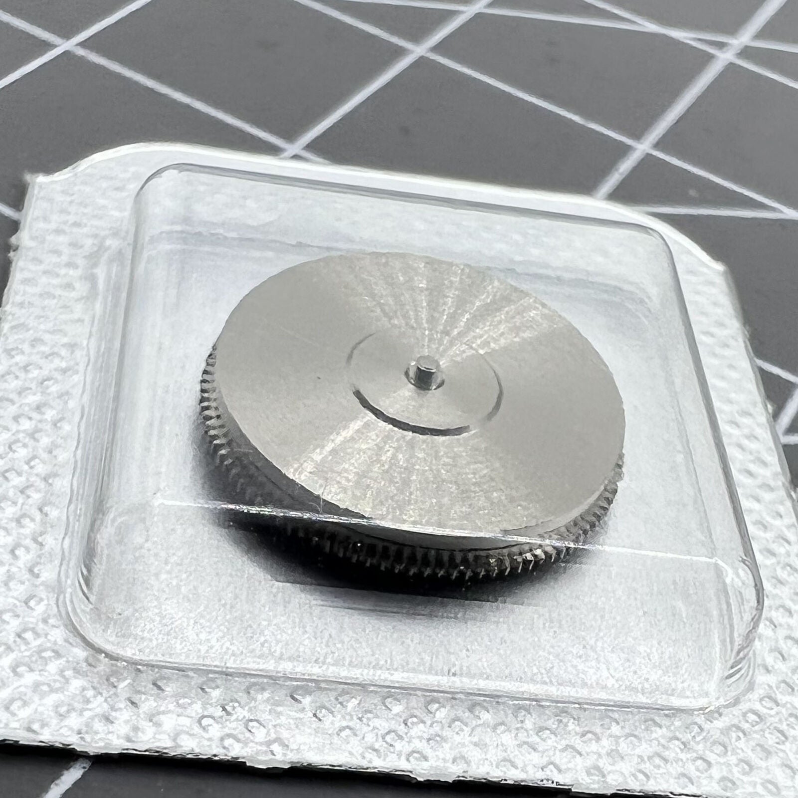 Barrel with complete mainspring for ETA C07.111 watch movement, precision component by ETA for reliable timekeeping.