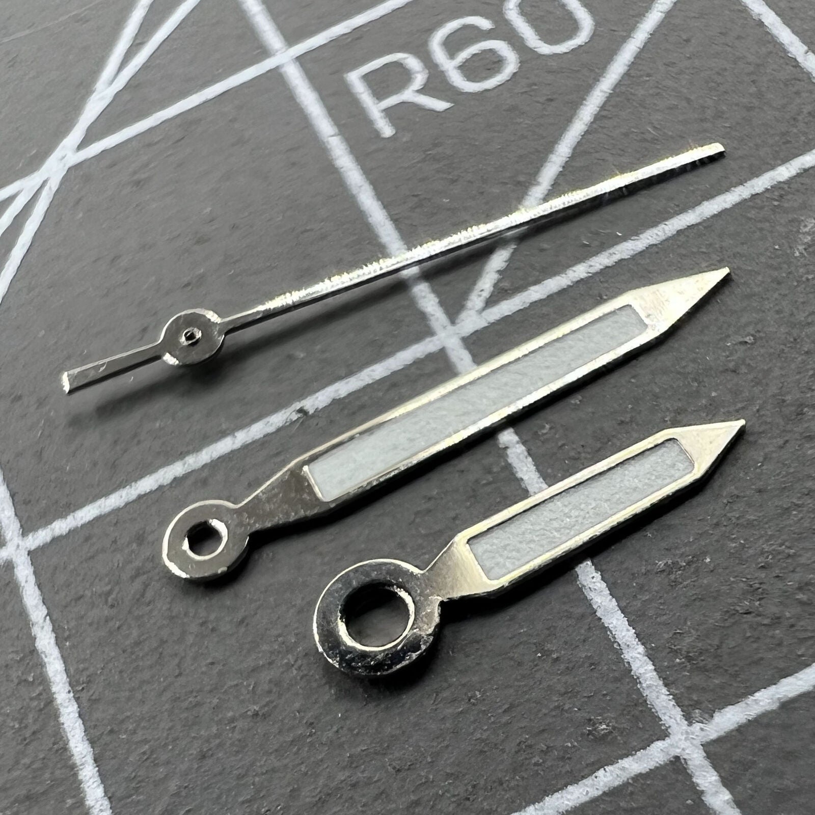 12mm silver-trimmed arrow green lume watch hands for Miyota 1M12, perfect for precise timekeeping