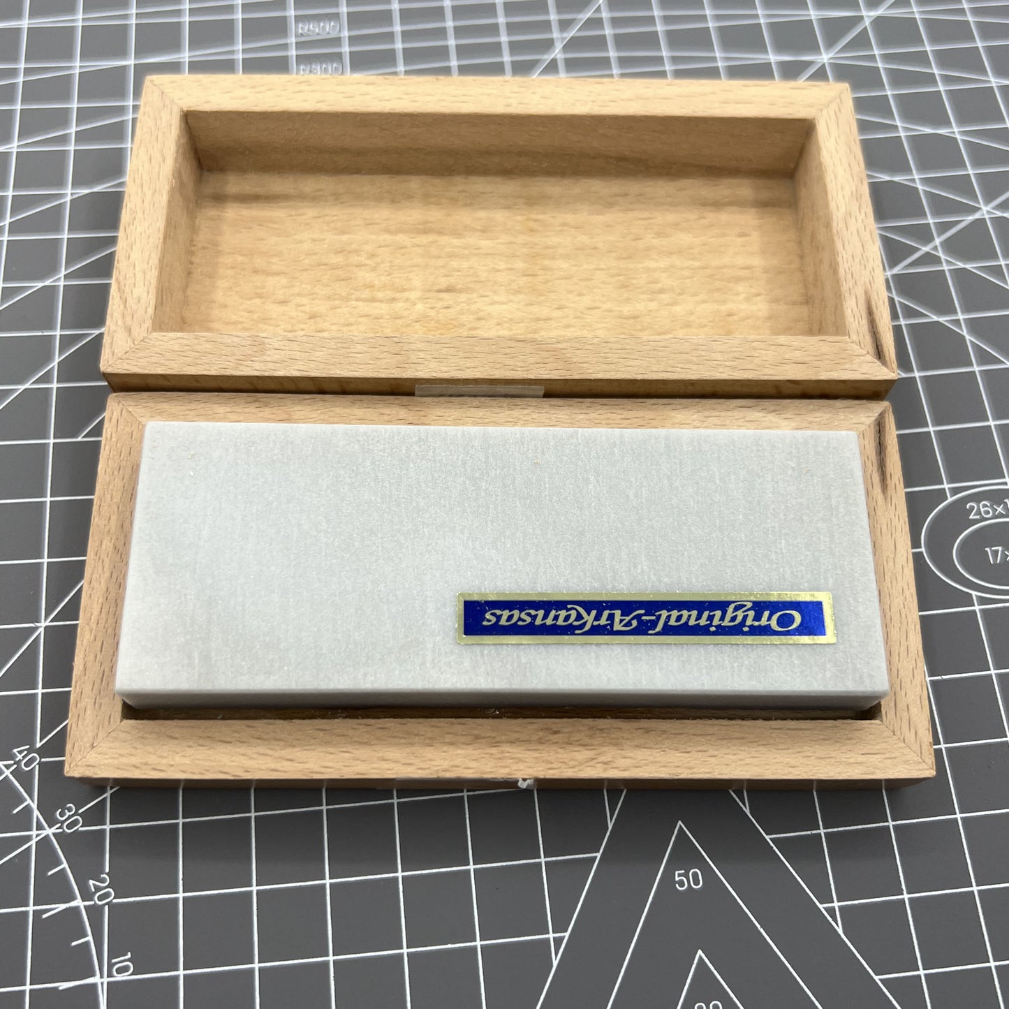 Swiss Tool Horotec MSA16.051 rectangular Arkansas stone in wooden box for precise watch accessory polishing and maintenance.