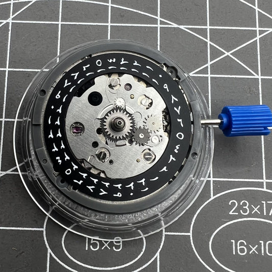 NH34 automatic GMT watch movement with hacking seconds and black Arabic font dial.