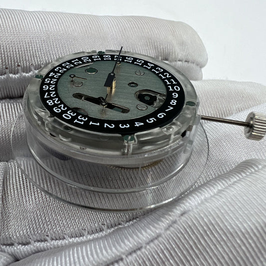 Swiss Made ETA C01.211 chronograph watch movement with black dial, mechanical precision by 1853 brand.