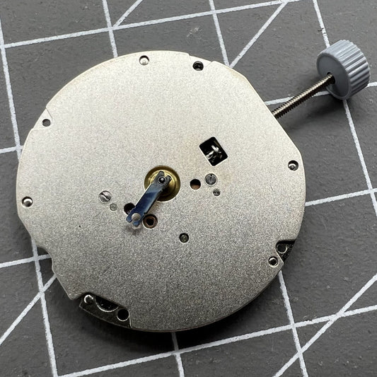 Swiss Ronda 703 quartz watch movement, high-precision timekeeping component for accessories.