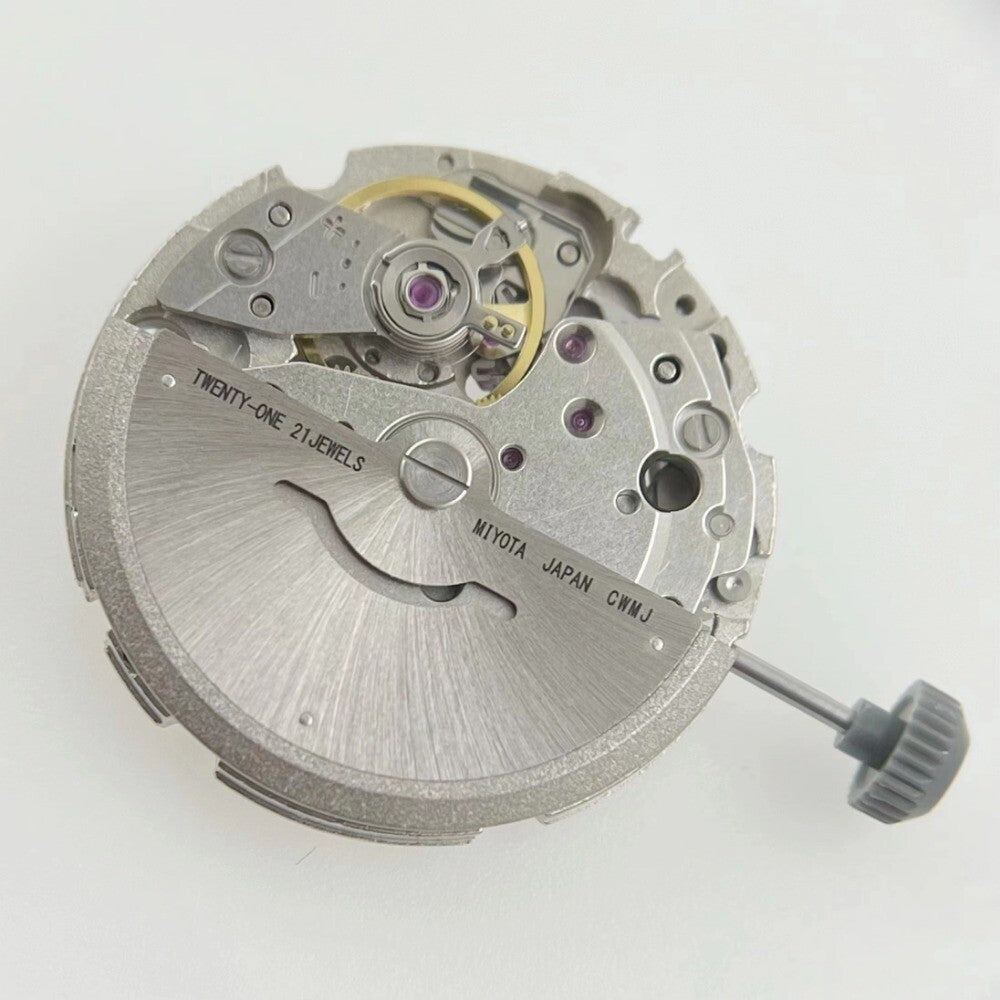 Miyota/Citizen 8215 automatic watch movement with black dial, date at 6, Japan-made precision components.