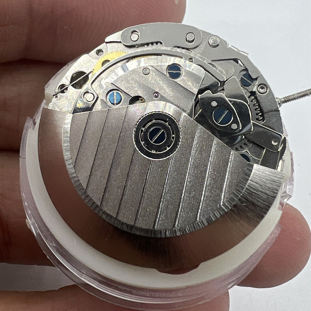 New China SHANGHAI 7750 automatic watch movement with day, date, and small seconds at 9 o'clock display.