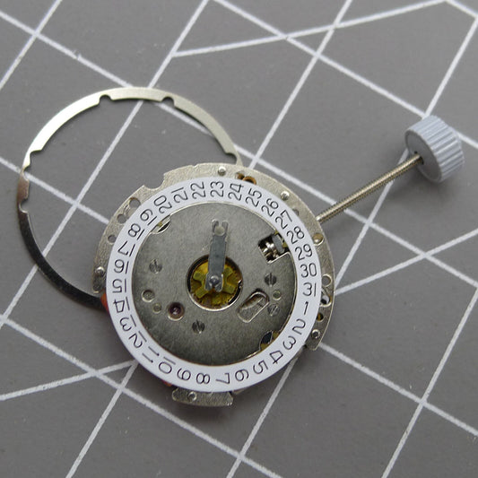 Swiss Made Ronda 774 quartz watch movement with date display at 3 o'clock, precision Swiss parts.