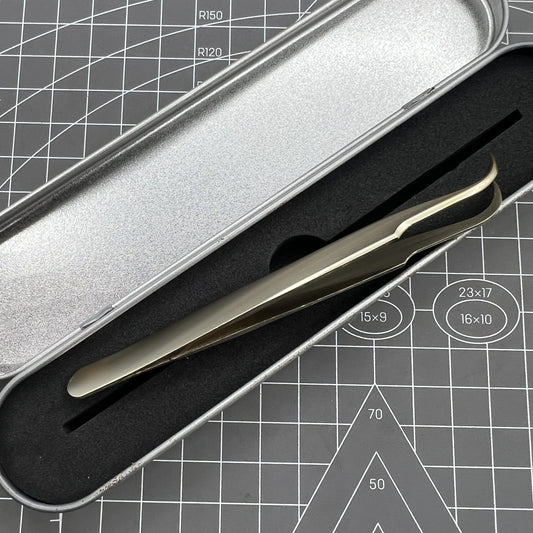Golden curved elbow forceps stainless steel tweezers for precise watch accessory handling.