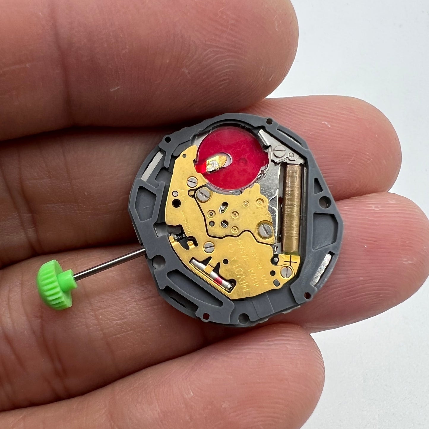 Miyota 4U74 quartz watch movement with date window at 6 o?clock, Japan-made for precise watch repairs.