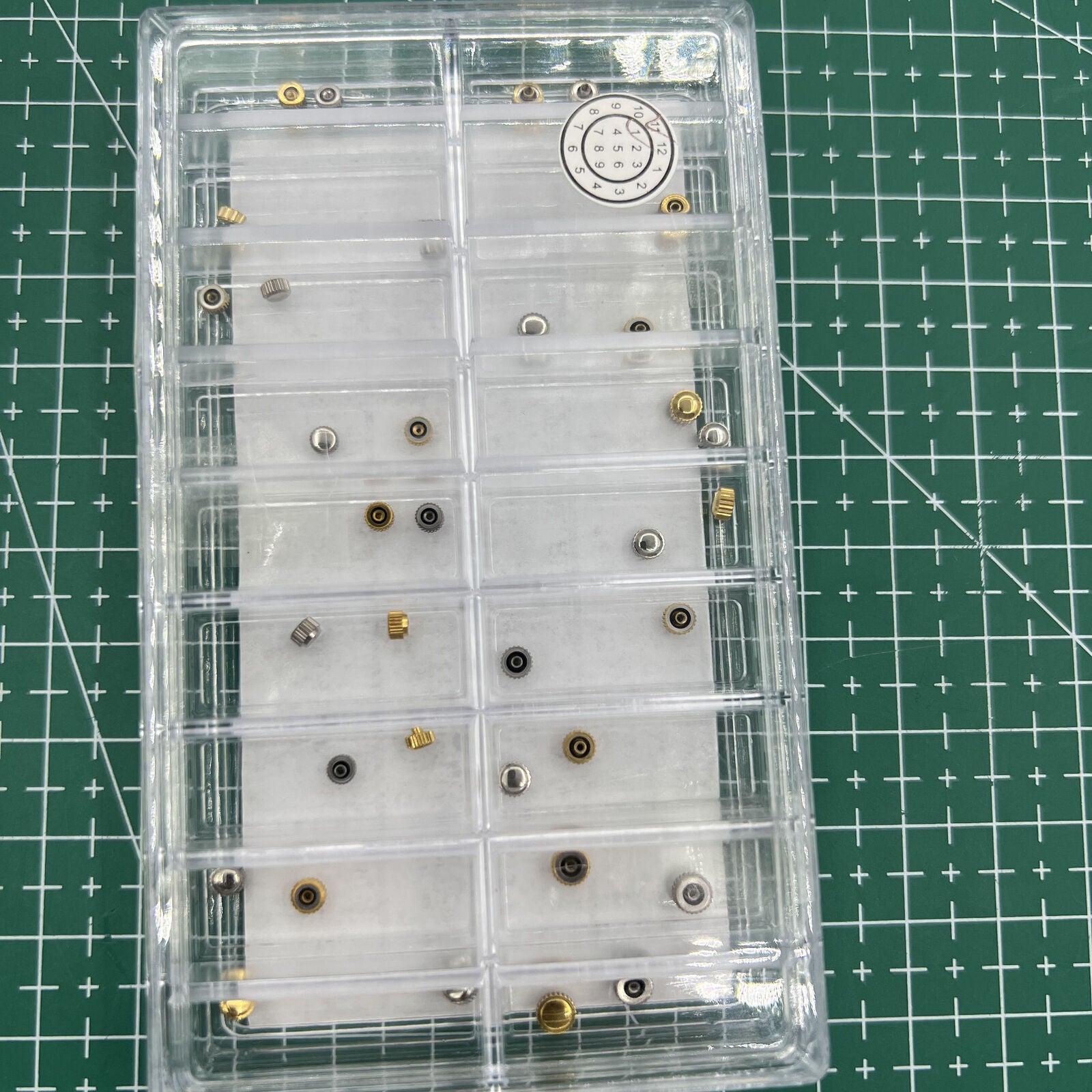 Stainless steel watch crowns kit, 36 pieces, Japan style, for precise watch repairs and adjustments.