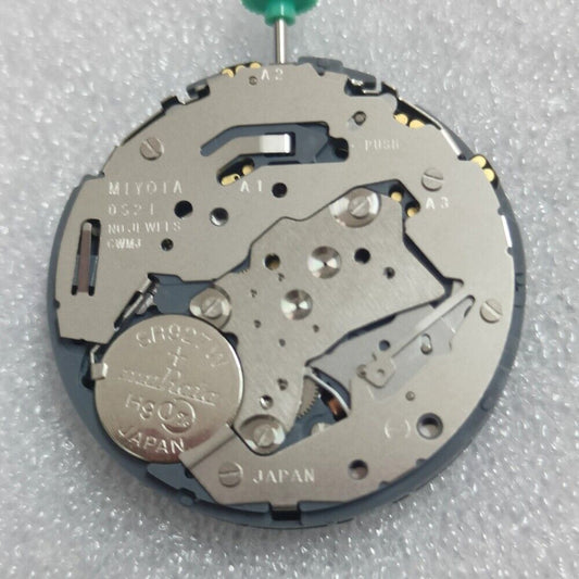 Japan-made Miyota OS21 quartz watch movement featuring a black disk wheel and zero jewels for precise timekeeping.