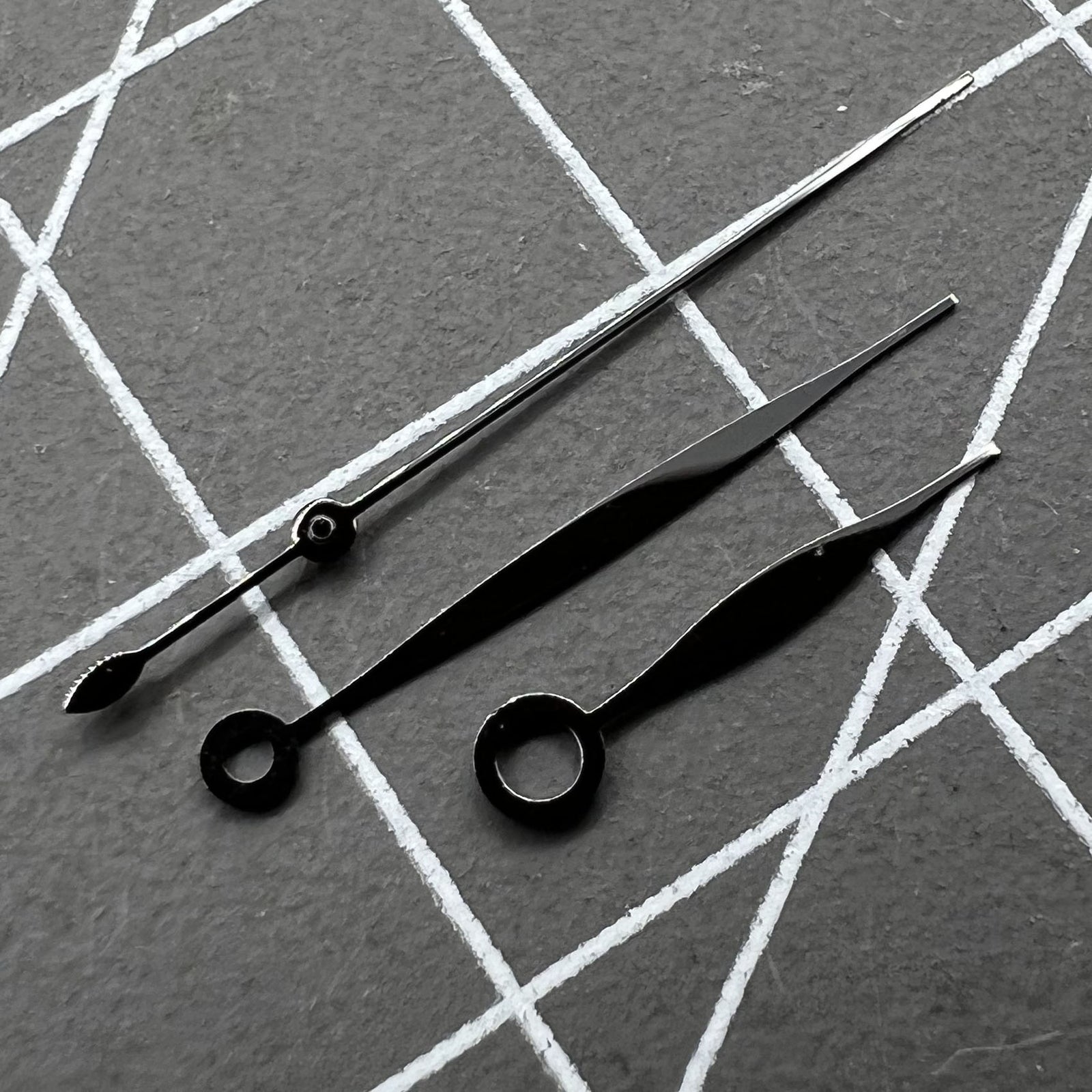 Black polished watch hands set for Tissot 1853 T41 T006 movement, 10.5x16x16mm precision fit by Tissot.