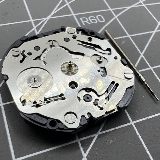 Japan Made Hattori Epson TMI VX3J VX3JE quartz watch movement for precise timekeeping.