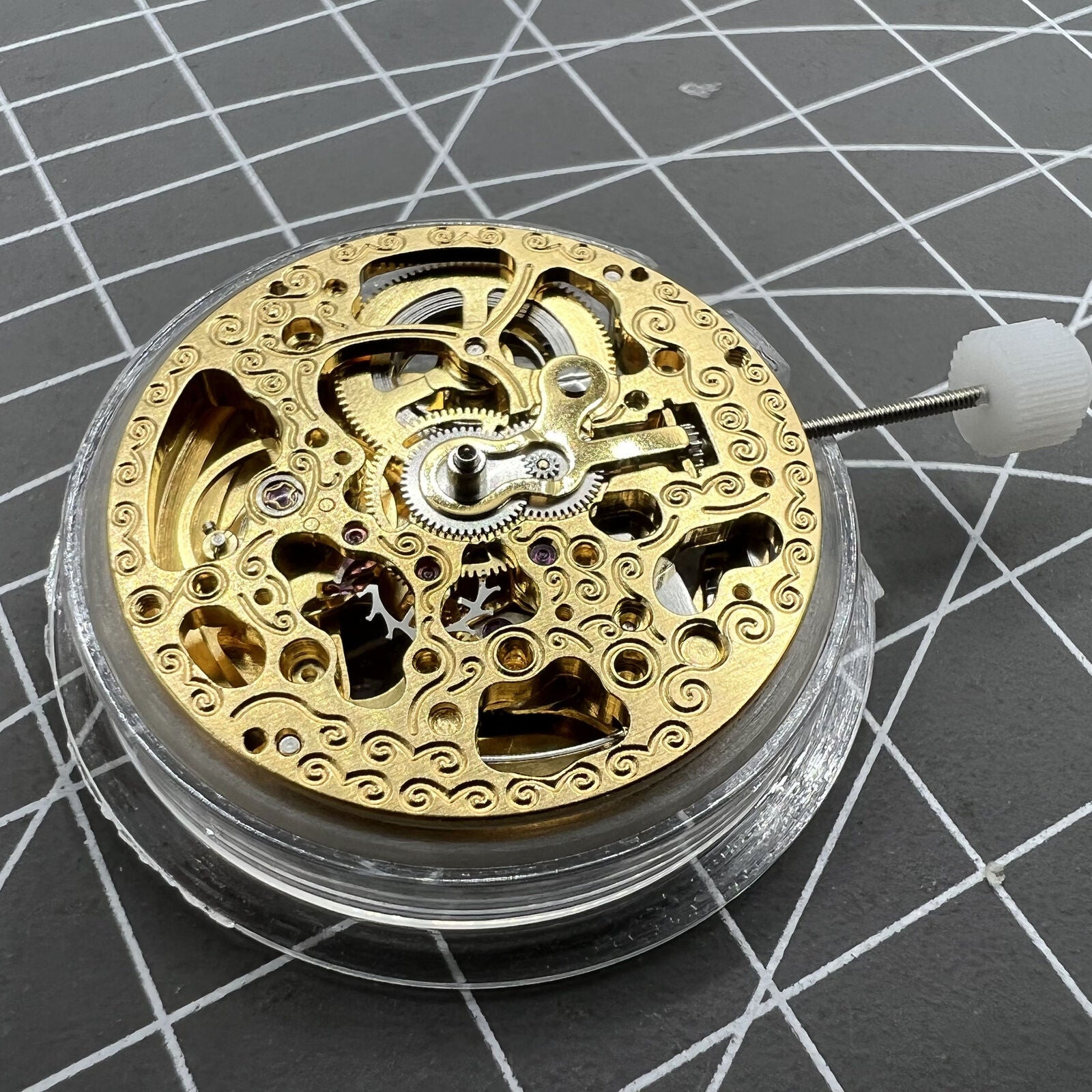 Hangzhou 2189 automatic watch movement featuring golden skeleton 3-hand design for accurate timekeeping.
