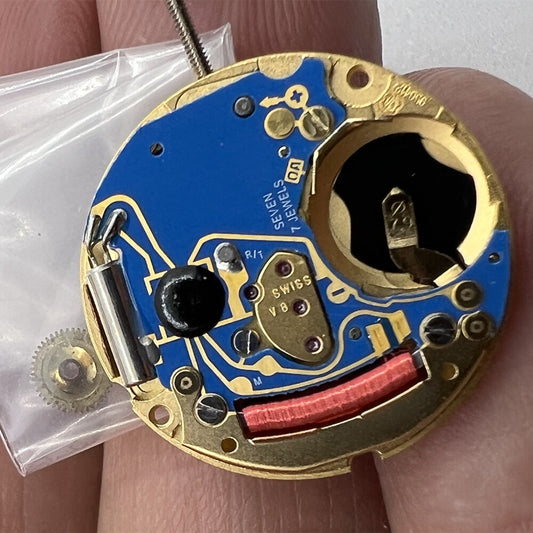Swiss ETA 956.412 quartz watch movement with 3 hands, date at 6, precision craftsmanship.