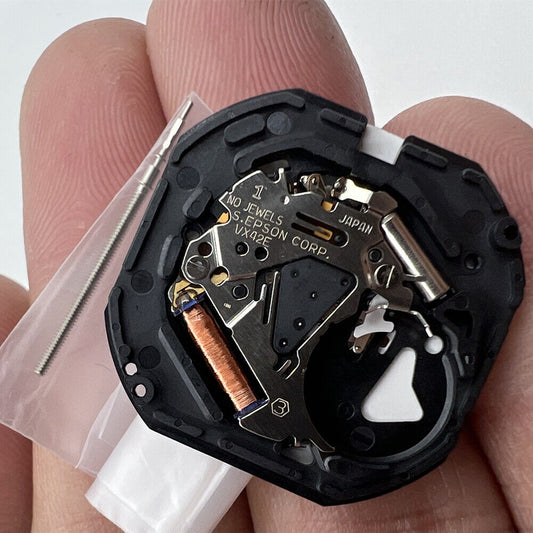 Shiojiri Hattori VX42 VX42E quartz watch movement showing day and date at 3 and 6 o'clock, brand new.