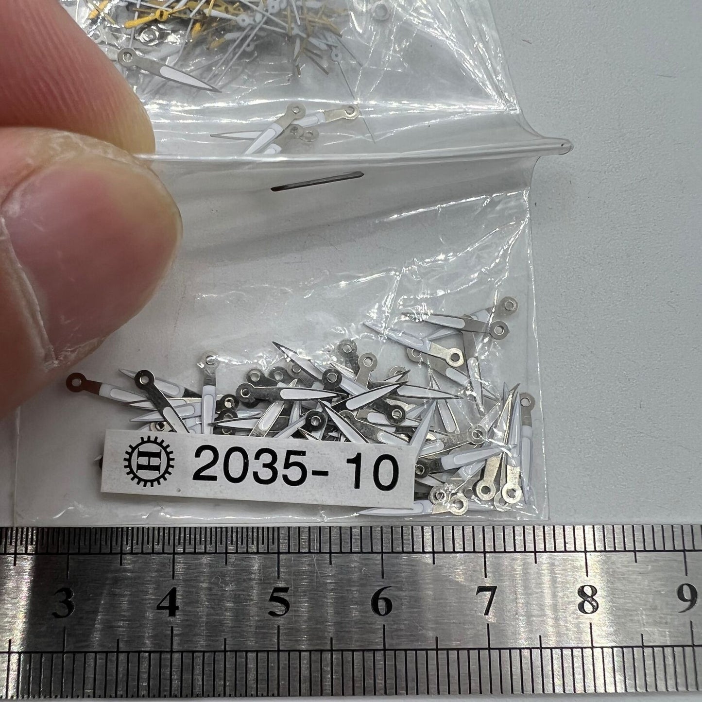 100 Sets 10 mm Uhrzeiger mit silbernem Rand und grüner Leuchtmasse für Miyota 2035 Quarzwerk