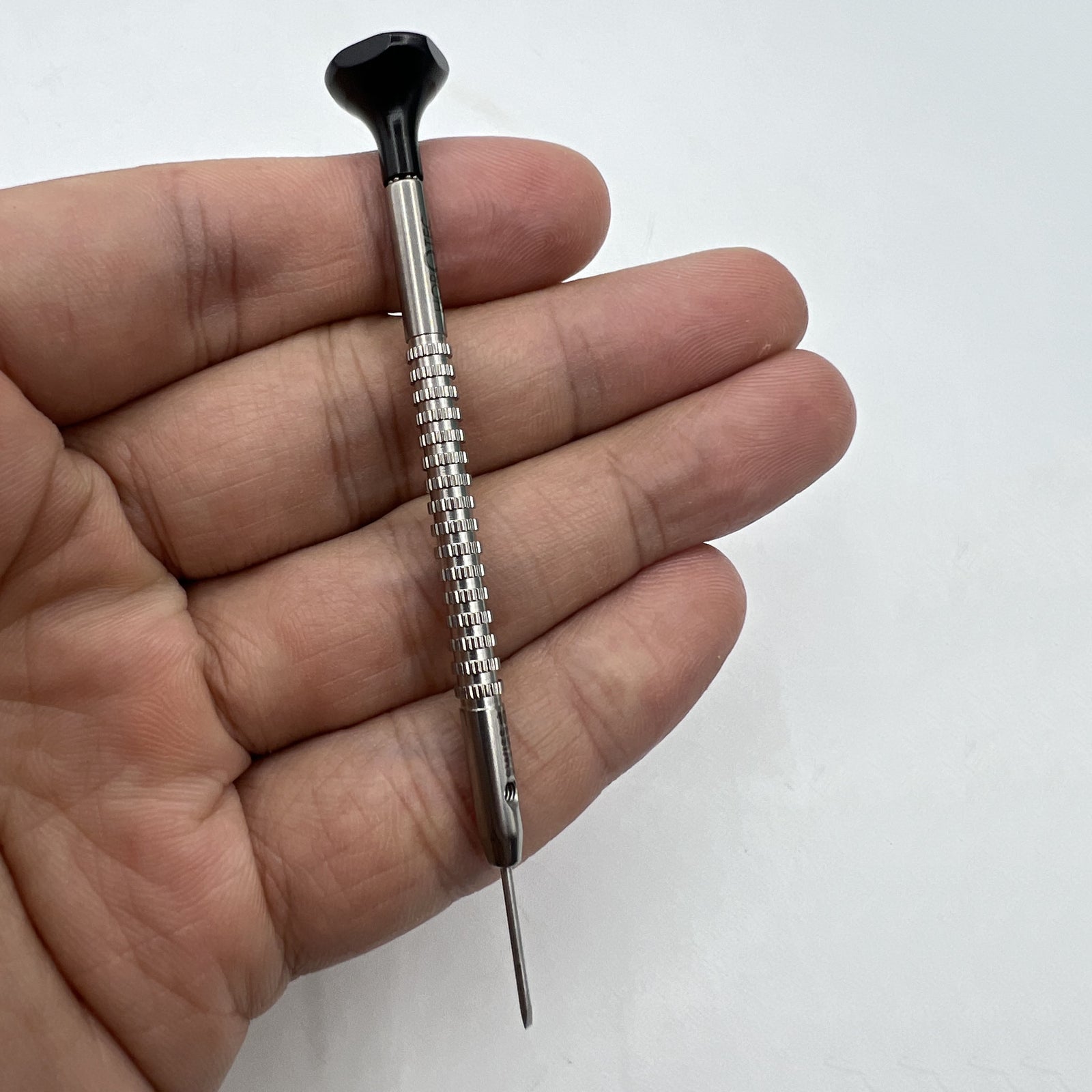 Horotec MSA01.218-100 black 1.00mm screwdriver for precise watch repair and delicate adjustments.