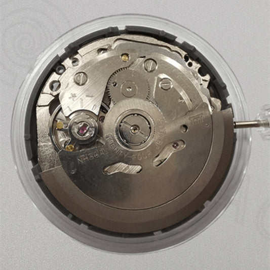 Seiko NH36A automatic watch movement with white dial, green lume, and 3/3.8 crown position for precise timekeeping.