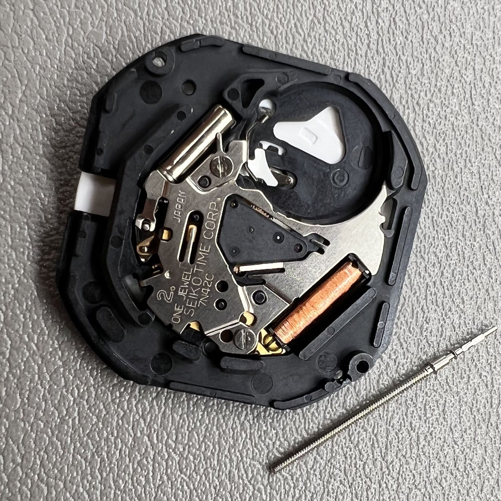 Seiko 7N42C quartz watch movement showcasing precise Japanese craftsmanship and reliable timekeeping.