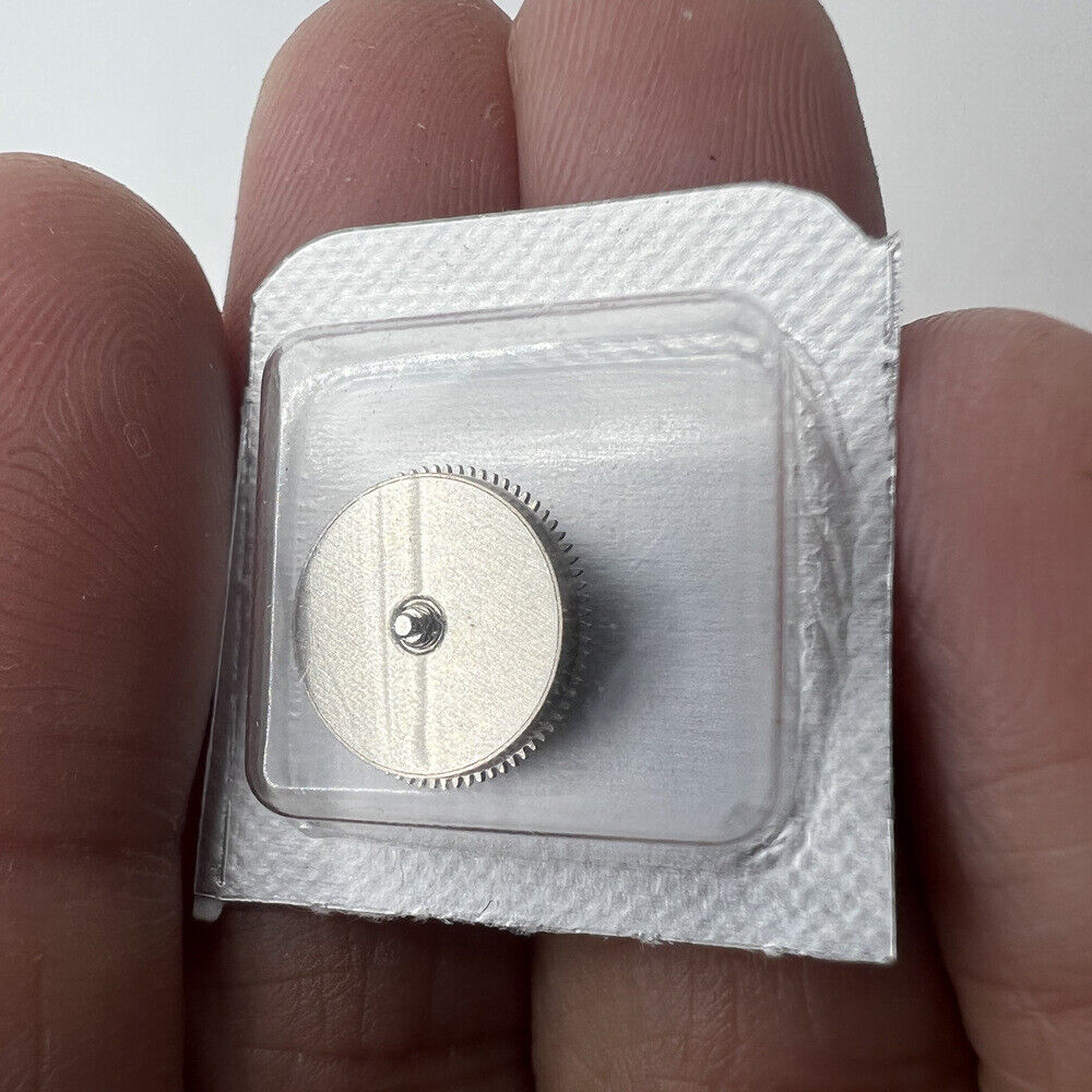 Silver barrel replacement with mainspring for Miyota 8200 8215 watch movement, durable and precise accessory.