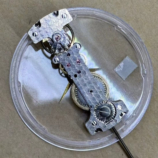 Chinese Strip shaped watch with 2 hands, automatic mechanical movement, carved matte polished finish.