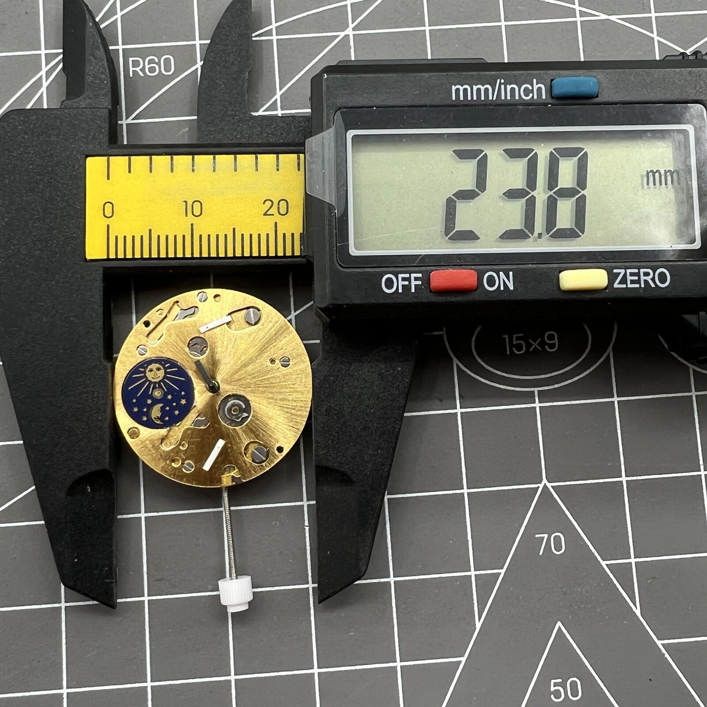 ISA 9231 quartz watch featuring Swiss star and moon phase at 6 o'clock.