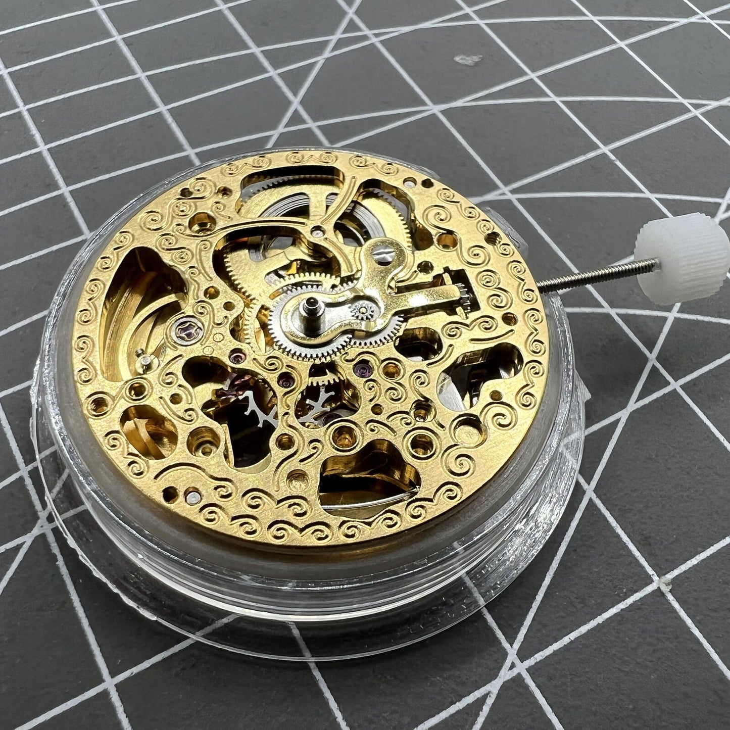 Hangzhou 2189 golden hollow watch accessory with automatic mechanical movement, elegant timepiece component.