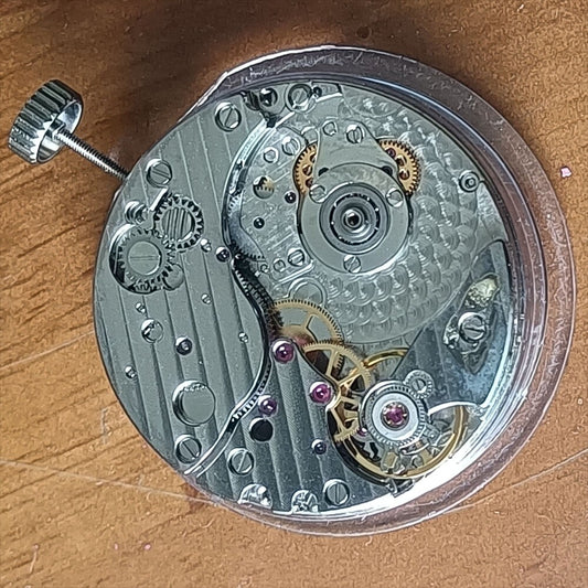 Hangzhou China made automatic watch with kinetic movement, small second at 4 o'clock, no rotor design.