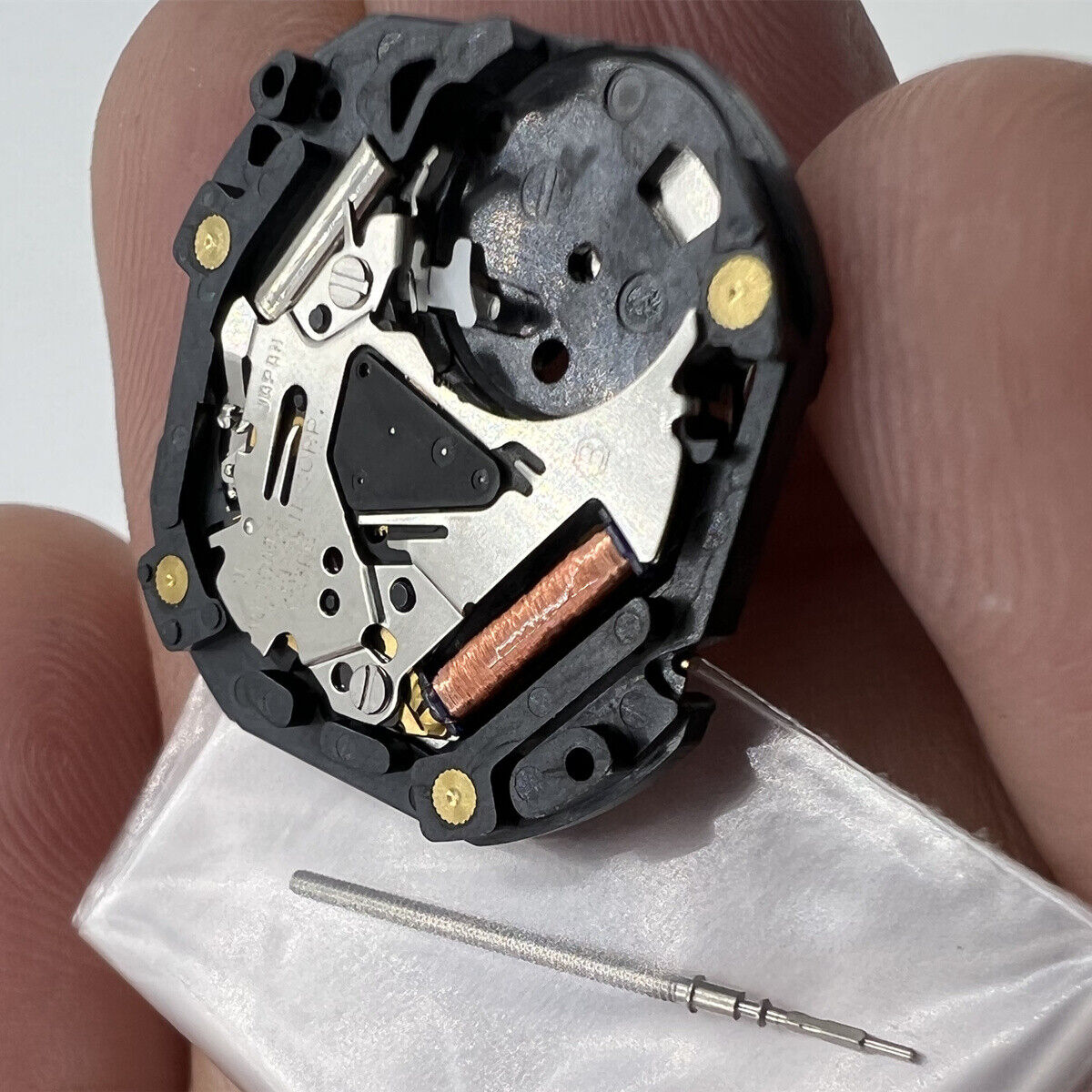 Hattori Epson VX3PE quartz movement showing Japan-made precision for reliable watch repairs.