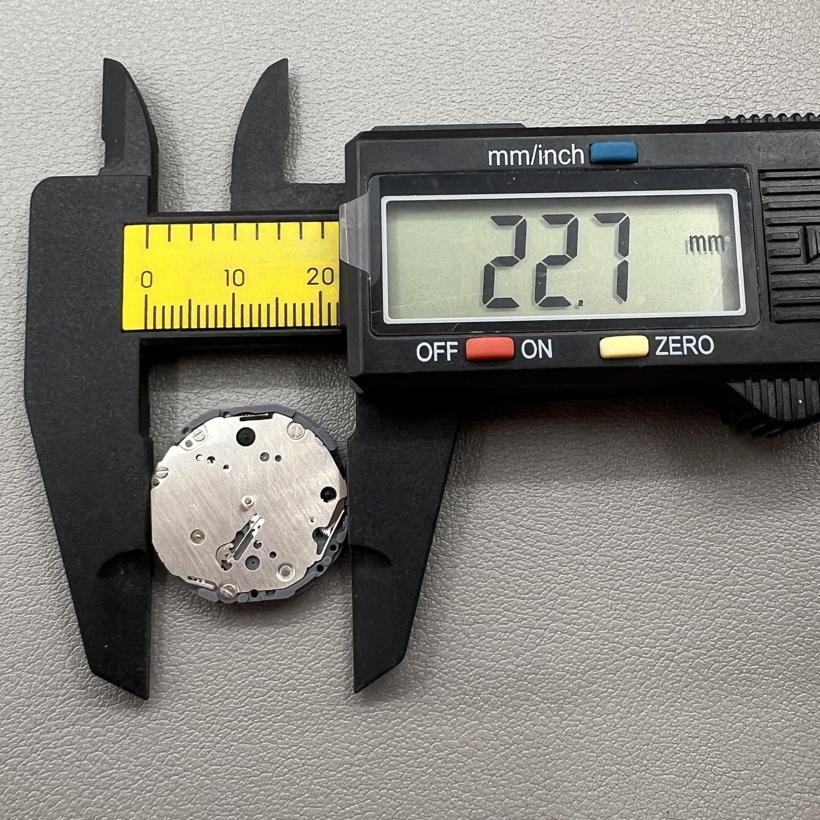 Japan Hattori Epson VD87A quartz watch movement showcasing precision timekeeping components.