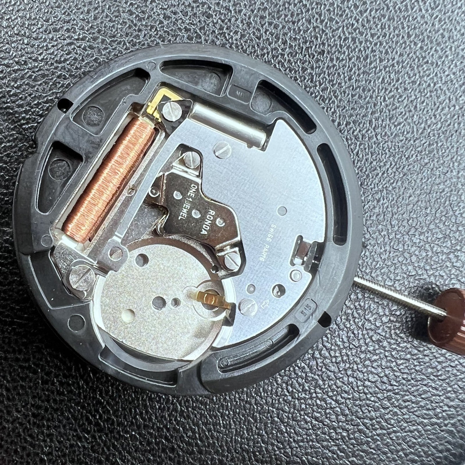 Swiss Ronda 515 quartz movement watch with HCP3 black disk and date display at 3 o?clock.