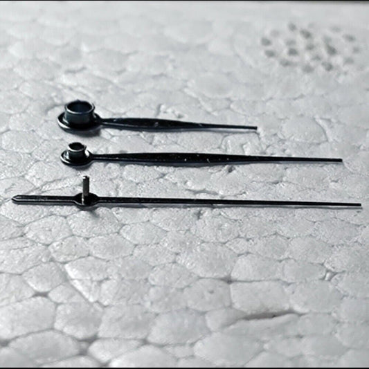 Polished blue leaf-shaped watch hands for LB06 movement, precise accessory.