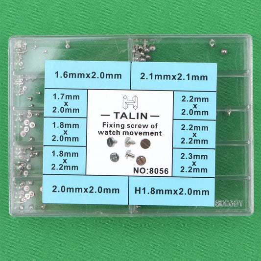 Precision screw assortment for watch movements, various sizes for repair and maintenance.