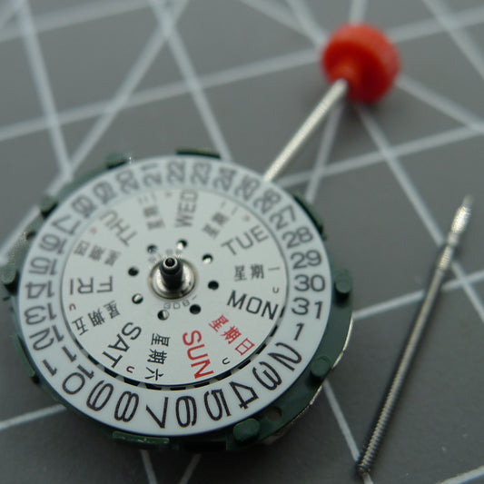 Japan-made Miyota/Citizen 2005 quartz movement with day-date function and watch stem for precise timekeeping.