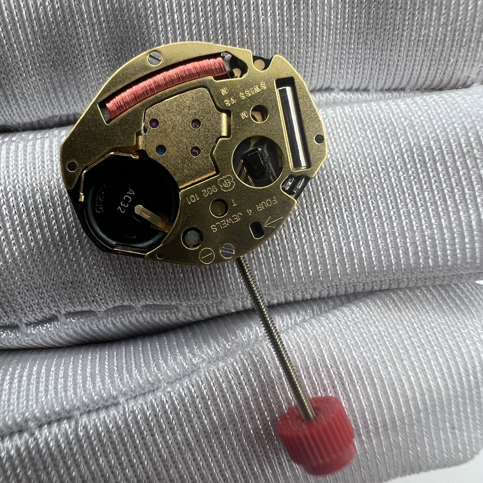 Swiss ETA 902.101 quartz watch movement with three hands, precise craftsmanship ideal for watch accessories.